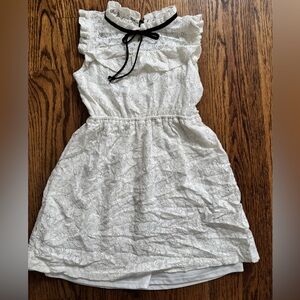 White lace dress with black ribbon